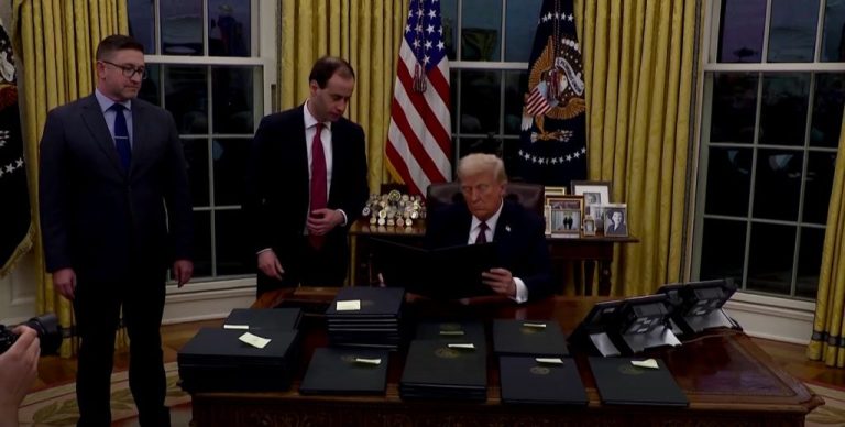 Trump aid freeze stirs chaos before it is blocked in court